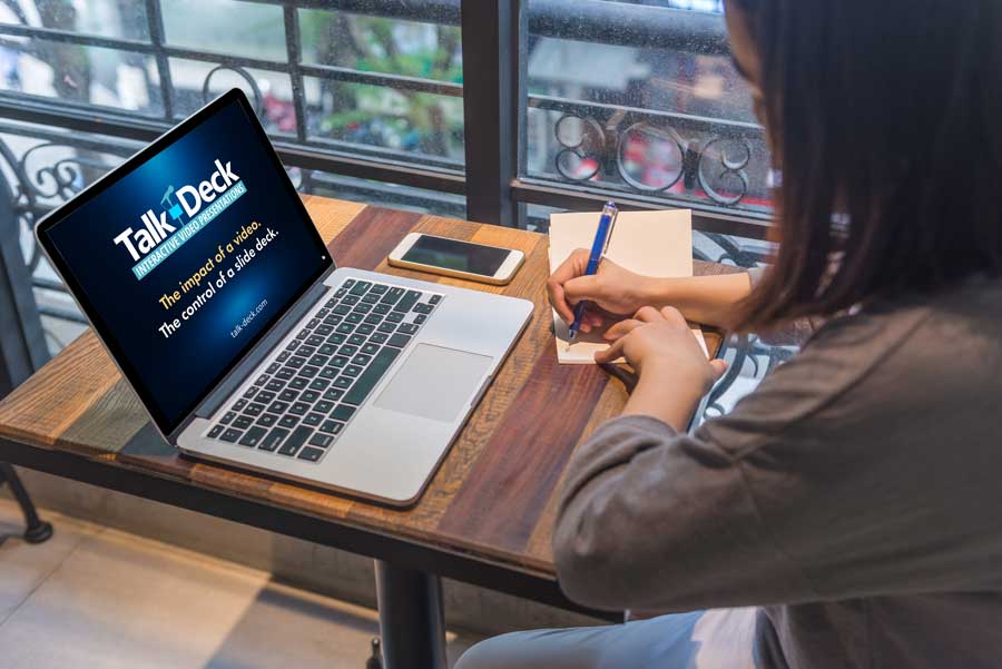 Young woman working at her laptop, outlining a structured presentation flow to maximize audience impact and message retention.